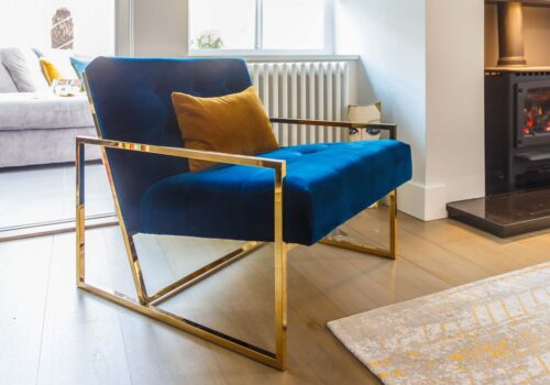 blue velvet and brass chair