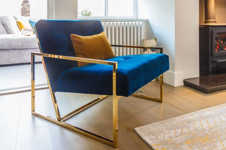 blue velvet and brass chair