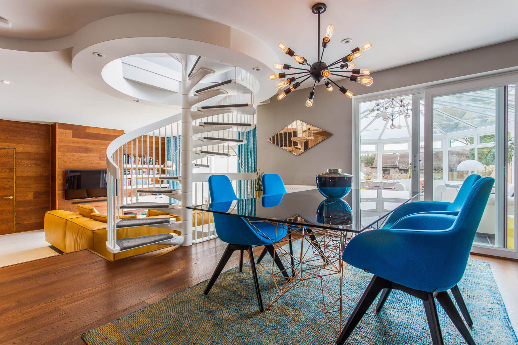 Modern dining area with stairs