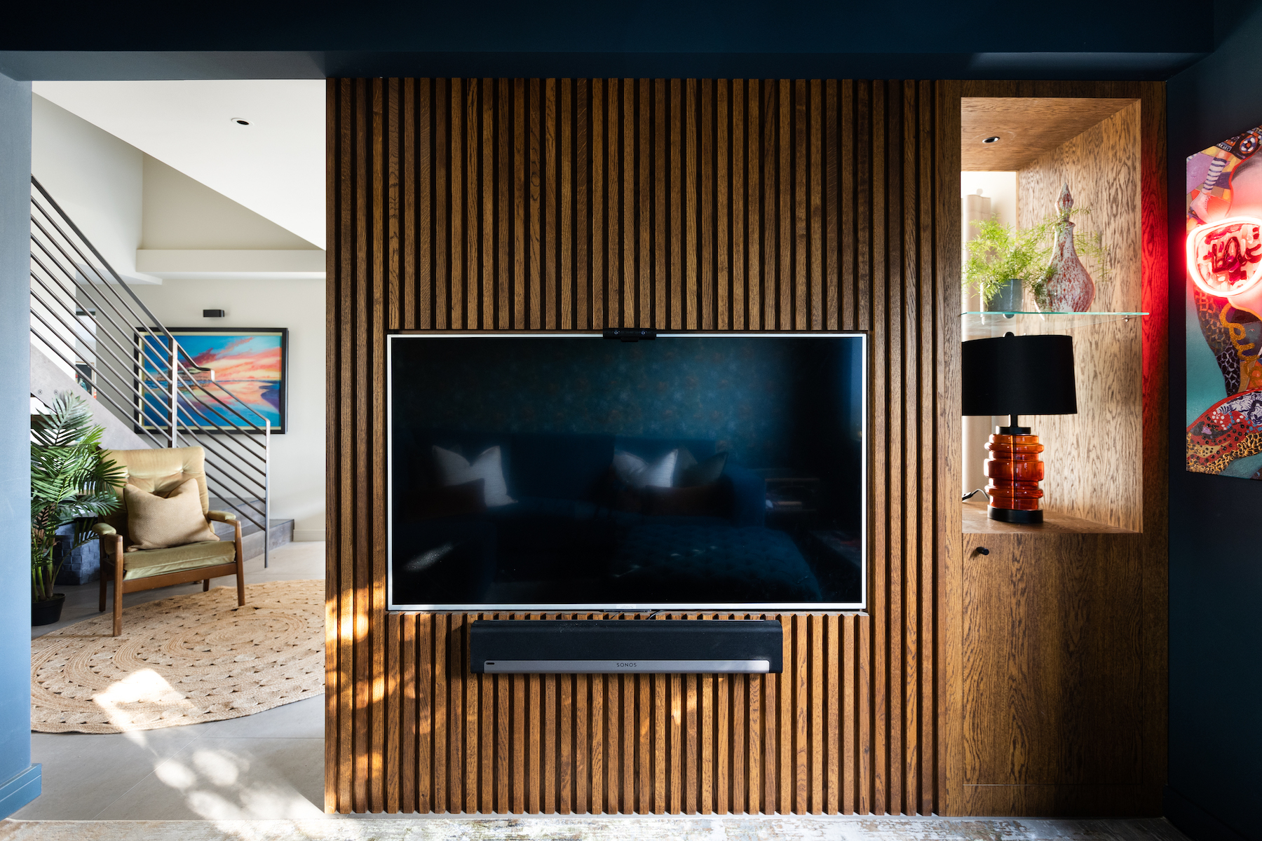 dual aspect media wall in our mid century modern beach house
