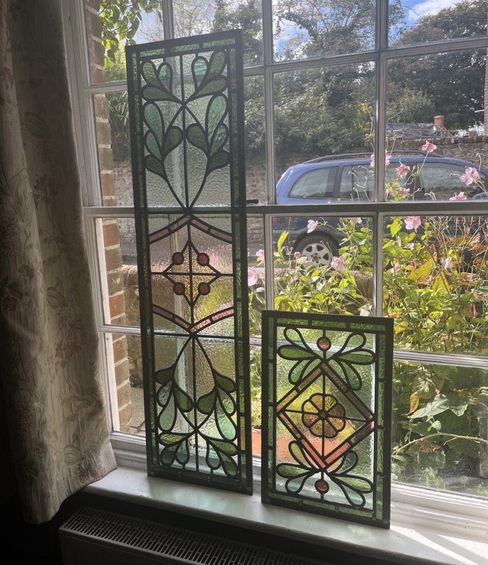 Bespoke stained glass window, design by Pfeiffer Design working with our stained glass window artisan to pick colours and patterns. Colour scheme is pinks and greens, reflecting the feminine aesthetic of the home