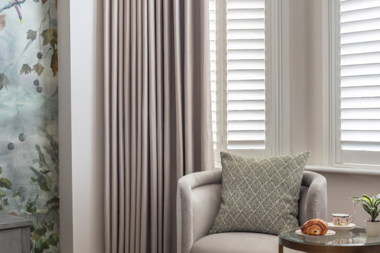 Contemporary Bedroom Designed with Bespoke headboard and Mural Wallpaper by Pfeiffer Design. bespoke upholstered chair, bespoke window treatments and custom lighting design. Neutral colour palette with warm lighting design