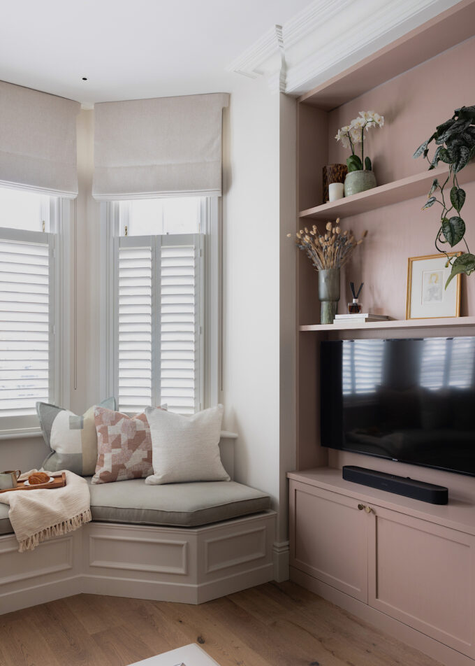 Contemporary living room with bespoke joinery and lighting design by Pfeiffer Design. Bespoke window treatments, neutral colour palette with warmth. Bespoke upholstered bench and bench cushion
