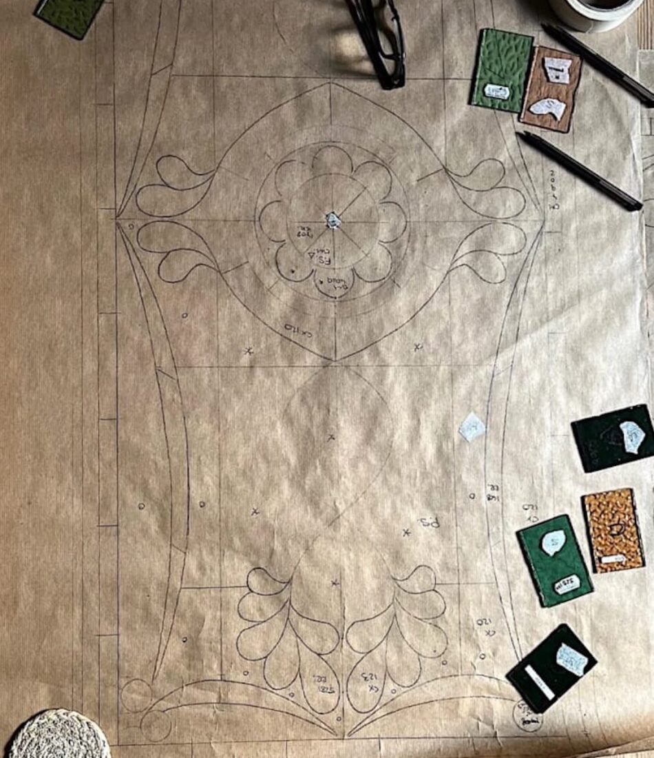 Tracing paper drawings of bespoke stained glass window design, working with our stained glass artisan on colours and patterns