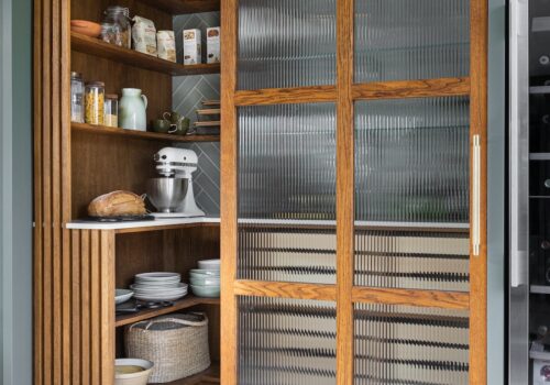 mid century modern beach house in East Sussex bespoke pantry and kitchen designed with our joiners and bespoke cabinetry designs in sustainable timber and materials