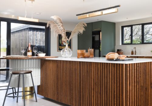 mid century modern beach house in East Sussex bespoke pantry and kitchen designed with our joiners and bespoke cabinetry designs. bespoke island in sustainable timber