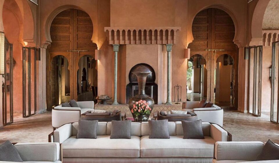 Moroccan terracotta interior hotel design with grey / neutral seating