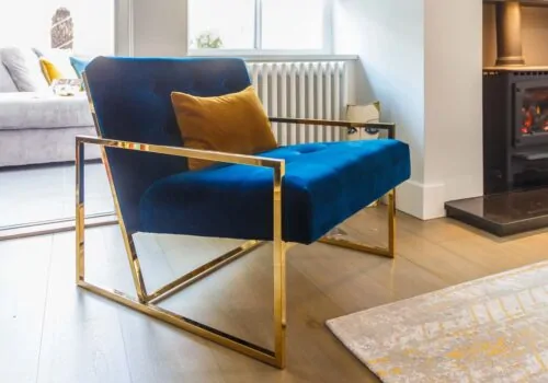 blue velvet and brass chair