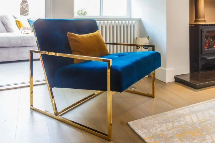 blue velvet and brass chair