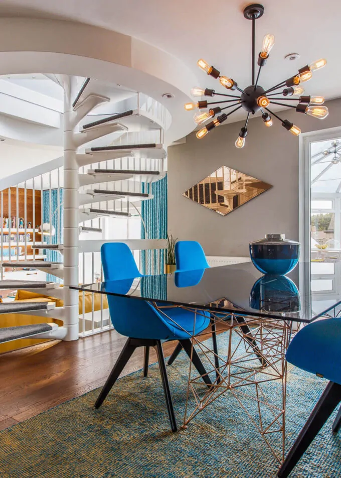Modern dining area with stairs