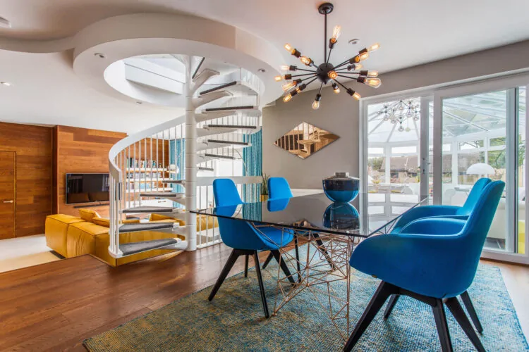 Modern dining area with stairs
