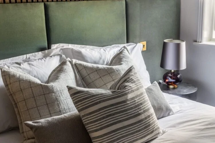 Bed with cushions