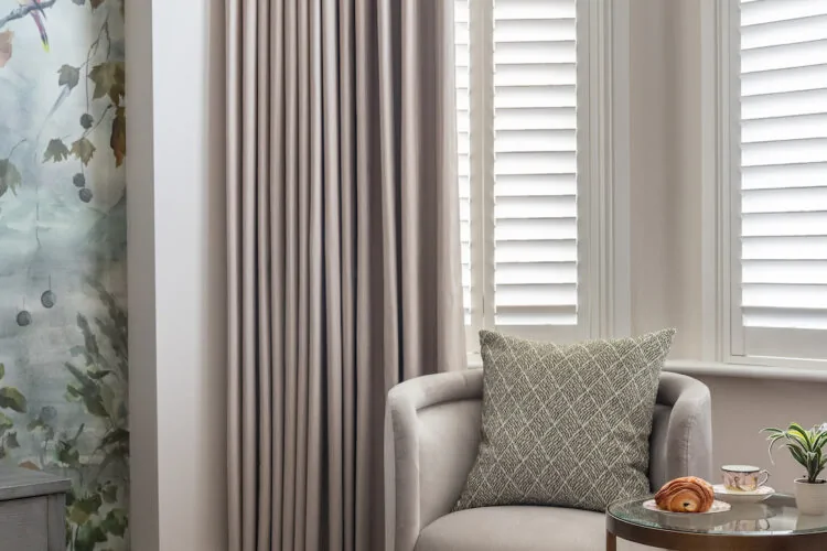 Contemporary Bedroom Designed with Bespoke headboard and Mural Wallpaper by Pfeiffer Design. bespoke upholstered chair, bespoke window treatments and custom lighting design. Neutral colour palette with warm lighting design