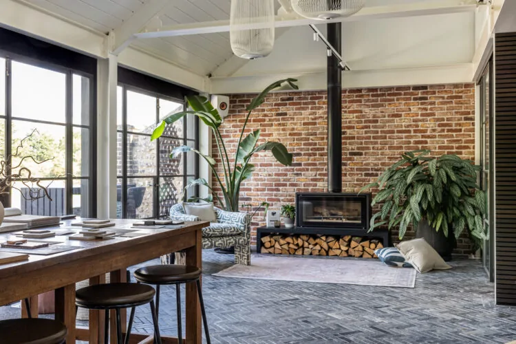 Pfeiffer Design Studio showing log burner, concept board table