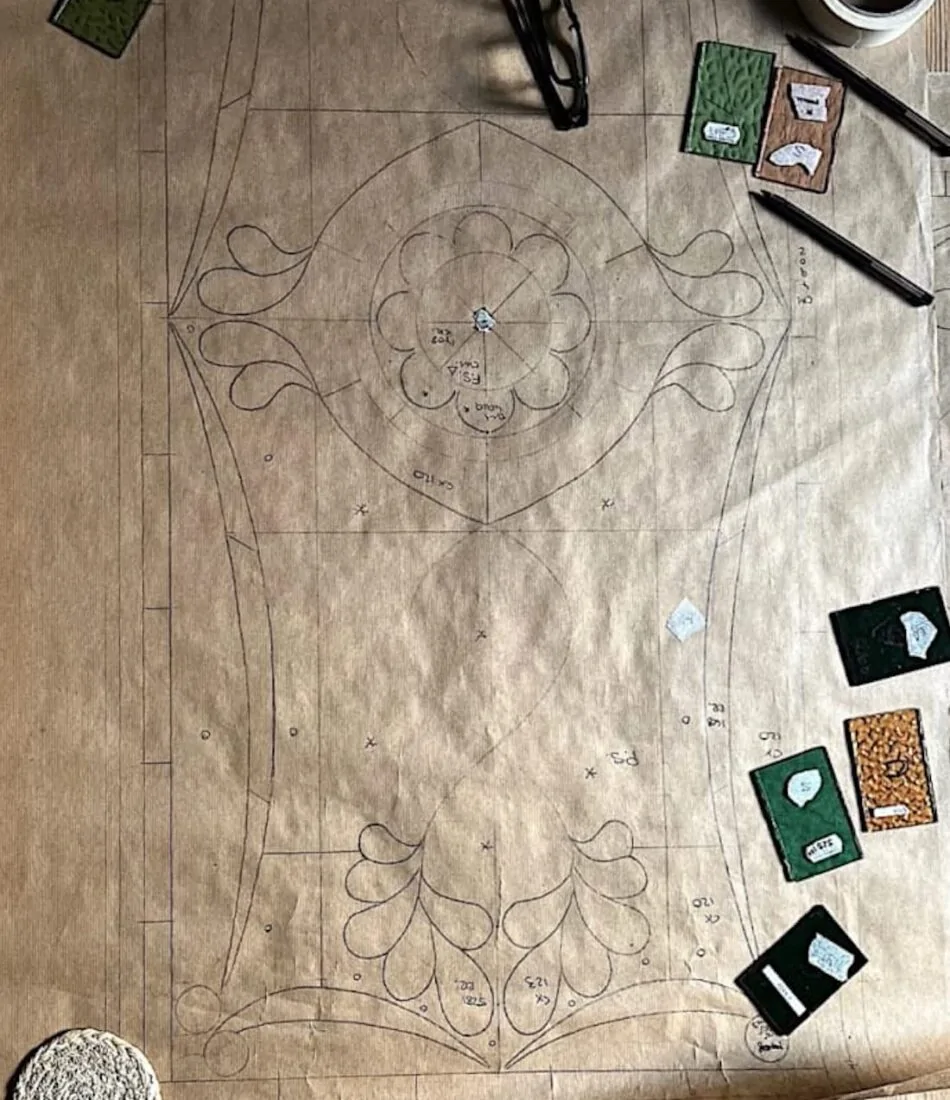 Tracing paper drawings of bespoke stained glass window design, working with our stained glass artisan on colours and patterns