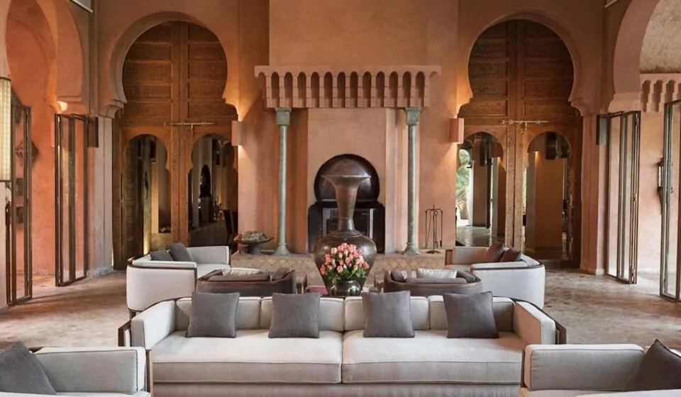 Moroccan terracotta interior hotel design with grey / neutral seating