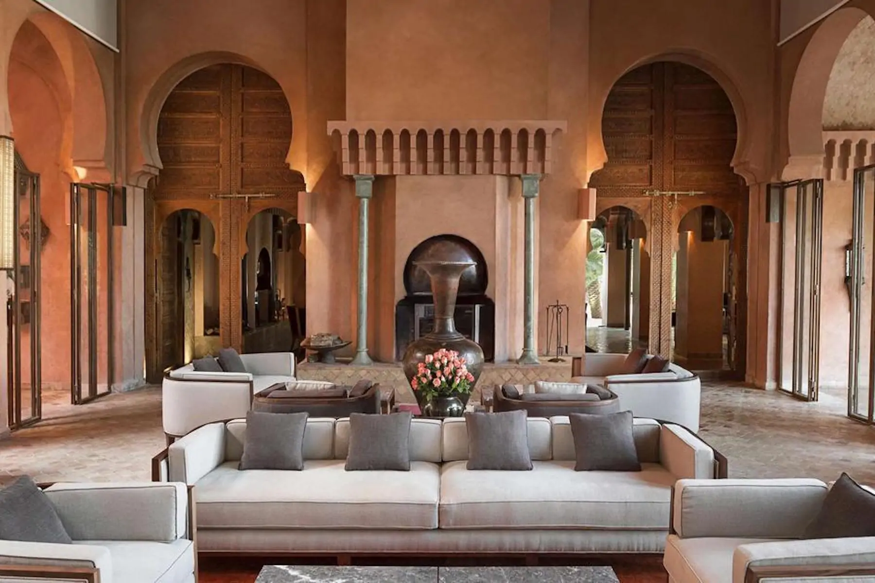 Moroccan terracotta interior hotel design with grey / neutral seating
