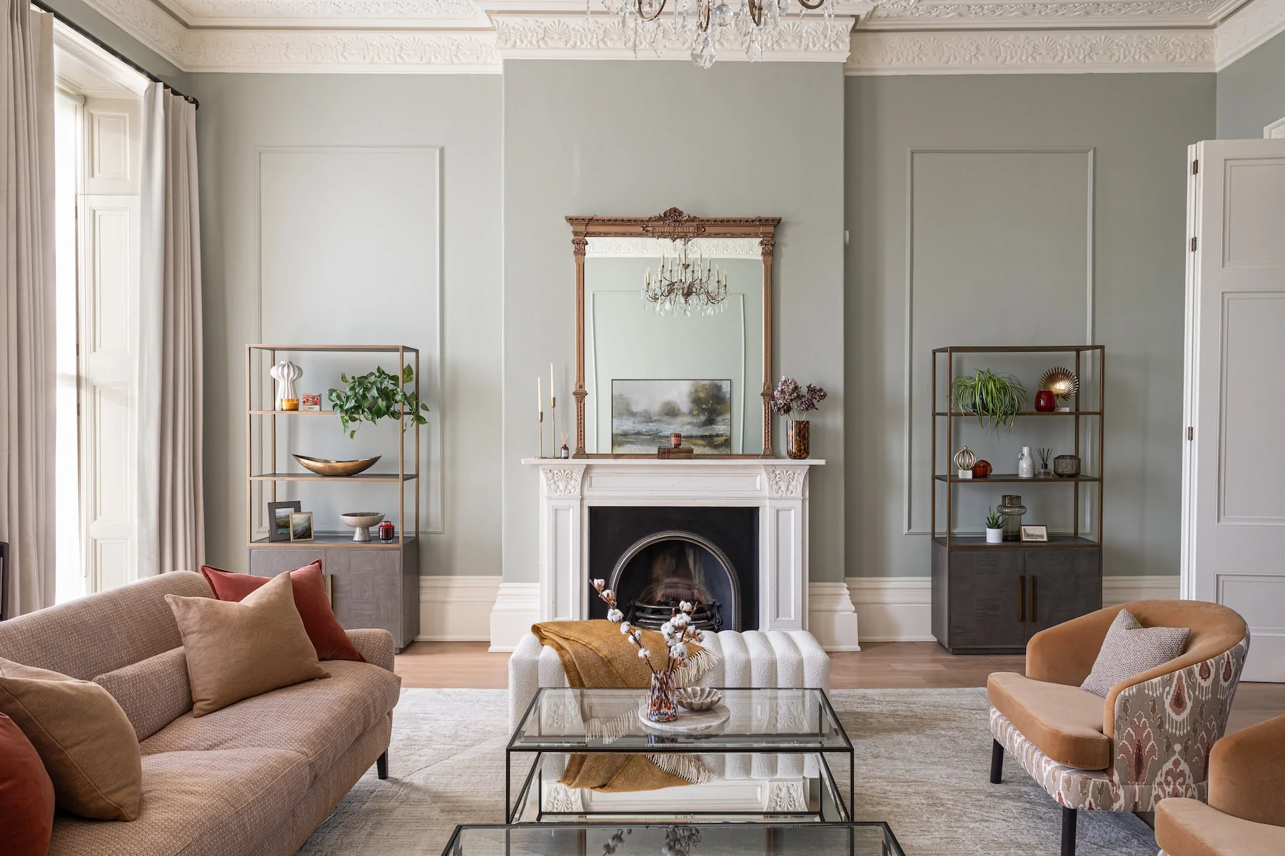 Regency Townhouse Lounge Living Room Interior Design with red, beige, warm patterns and yellow cushions