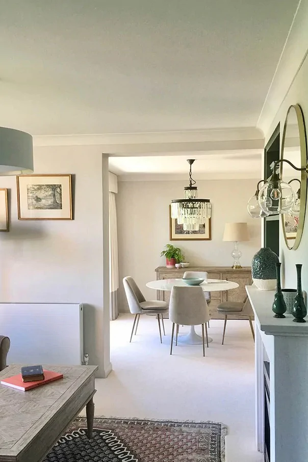 Elegant retirement flat with contemporary dining area and traditional furnishings.
